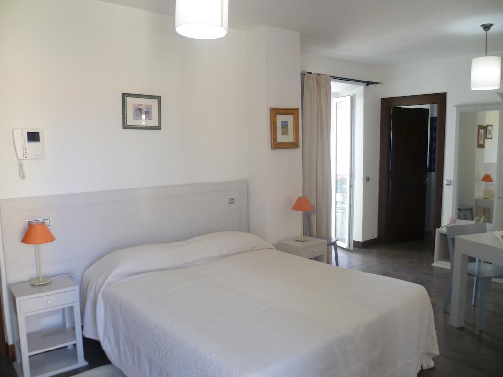 Albergo Residenziale La Corte ตอร์โตลี ห้อง รูปภาพ