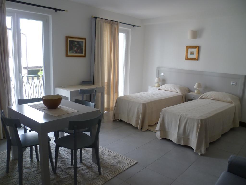 Albergo Residenziale La Corte ตอร์โตลี ห้อง รูปภาพ